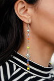 Featuring a mismatched finish, a collection of blue, orange, yellow, and green seed beads trickle along an elongated silver chain. A strand of silver classic and ball chain stream from the bottom of a silver star - also infused along the shoulder-dusting chain - creating a trendy tassel. Earring attaches to a standard fishhook fitting.  Sold as one pair of earrings.