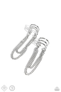 Trestles of dainty shimmery silver chains cascade from the bottom of a stacked, airy silver cuff, creating an adjustable, edgy, one-size-fits-all display.  Sold as one pair of cuff earrings.