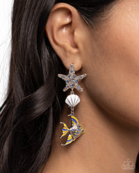 Featuring dainty blue rhinestones, a silver shatter-hammered starfish shimmers from the ear, giving way to a white pearl-painted silver seashell and royal blue and High Visibility-detailed and painted silver fish for a colorfully coastal look. Earring attaches to a standard post fitting.  Sold as one pair of post earrings.