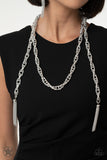 A single strand of spiraling, interlocking links with light-catching texture is anchored by two tassels of chain that add dramatic length to the piece. Undeniably the most versatile piece in Paparazzi's history, the scarf necklace features FIVE different ways to accessorize: Open Layer, Loop, Traditional Wrap, Double Knot, and Nautical Knot.