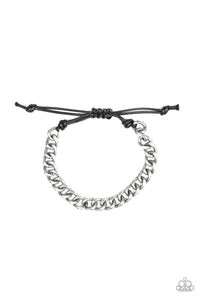 Shiny black cording knots around the ends of an antiqued silver beveled cable chain that is wrapped across the top of the wrist for a versatile look. Features an adjustable sliding knot closure.