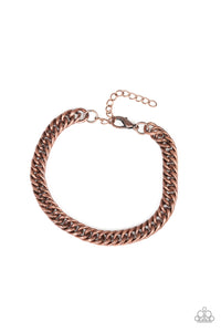 Brushed in an antiqued finish, a faceted copper chain links around the wrist for a rustic look. Features an adjustable clasp closure