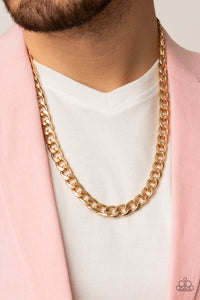 A thick gold strand of curb chain drapes below the collar for a bold industrial look. Features an adjustable clasp closure.  Sold as one individual necklace.   Get The Complete Look! Bracelet: "Knock, Knock, KNOCKOUT - Gold" (Sold Separately)