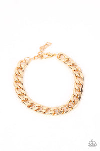 A thick gold strand of curb chain drapes around the wrist for a bold industrial look. Features an adjustable clasp closure.  Sold as one individual bracelet.   Get The Complete Look! Necklace: "Knockout Champ - Gold" (Sold Separately)