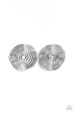 Shiny silver bars delicately bend and coil into a springy spiral, creating a dizzying frame. Earring attaches to a standard post fitting.  Sold as one pair of post earrings.