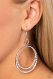 Dainty white rhinestones sparkle along the bottoms of a hammered silver hoop that splits into glistening layers, creating a glamorous effect. Earring attaches to a standard fishhook fitting.  Sold as one pair of earrings.