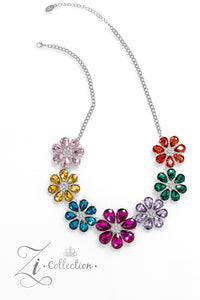 Colorful teardrop-shaped petals fan out around clusters of corrugated sparkle, blossoming into an enchanted kaleidoscope. The faceted surfaces of each petal add texture and depth, allowing the floral frames to pop with 3D detail and further highlight the spectrum of color at play. Features an adjustable clasp closure.