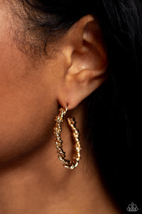 Featuring a braided motif, twisted gold ribbons encircle the ear for an industrially glitzy statement. Earring attaches to a standard post fitting. Hoop measures approximately 1 1/2" in diameter.  Sold as one pair of hoop earrings.