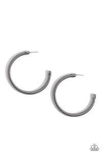 Shimmering gunmetal spins into an oversized twisted rope as it curves into a classic thick hoop design. Earring attaches to a standard post fitting. Hoop measures approximately 2" in diameter.  Sold as one pair of hoop earri