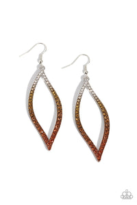 A glistening asymmetrical silver leaf-like frame is encrusted in glassy white rhinestones that gradually fade from brass to copper, creating a colorful ombre effect for a statement-making look. Earring attaches to a standard fishhook fitting.