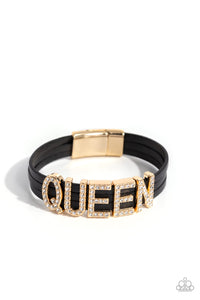 <p>Featuring glistening white rhinestones, gold letter frames forming the word "QUEEN" are threaded along layers of black leather strands around the wrist for a dazzling statement. Features a magnetic closure.</p> <p><i>Sold as one individual bracelet.</i></p>