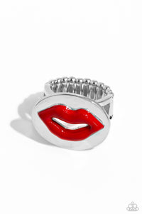 <p>Featuring a textured sheen, a pair of red lips puckers atop an oval silver disc on airy silver bands to create a youthful centerpiece. Features a stretchy band for a flexible fit.</p> <p><i> Sold as one individual ring.</i></p>