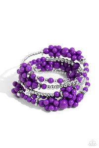 <p>Strands of sleek silver beads and accents mixed with plum acrylic beads in varying sizes are threaded along an infinity wrap-style bracelet. Clusters of beads are sporadically infused along the design, creating cloud-like, ethereal layers around the wrist.</p> <p><i> Sold as one individual bracelet.</i></p>