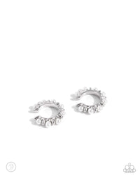 Glossy white pearls alternate with high-sheen silver spikes that curl around the ear in a refined pattern, creating an adjustable, one-size-fits-all cuff.  Sold as one pair of cuff earrings.