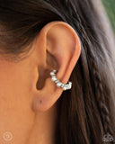 Glossy white pearls alternate with high-sheen silver spikes that curl around the ear in a refined pattern, creating an adjustable, one-size-fits-all cuff.  Sold as one pair of cuff earrings.